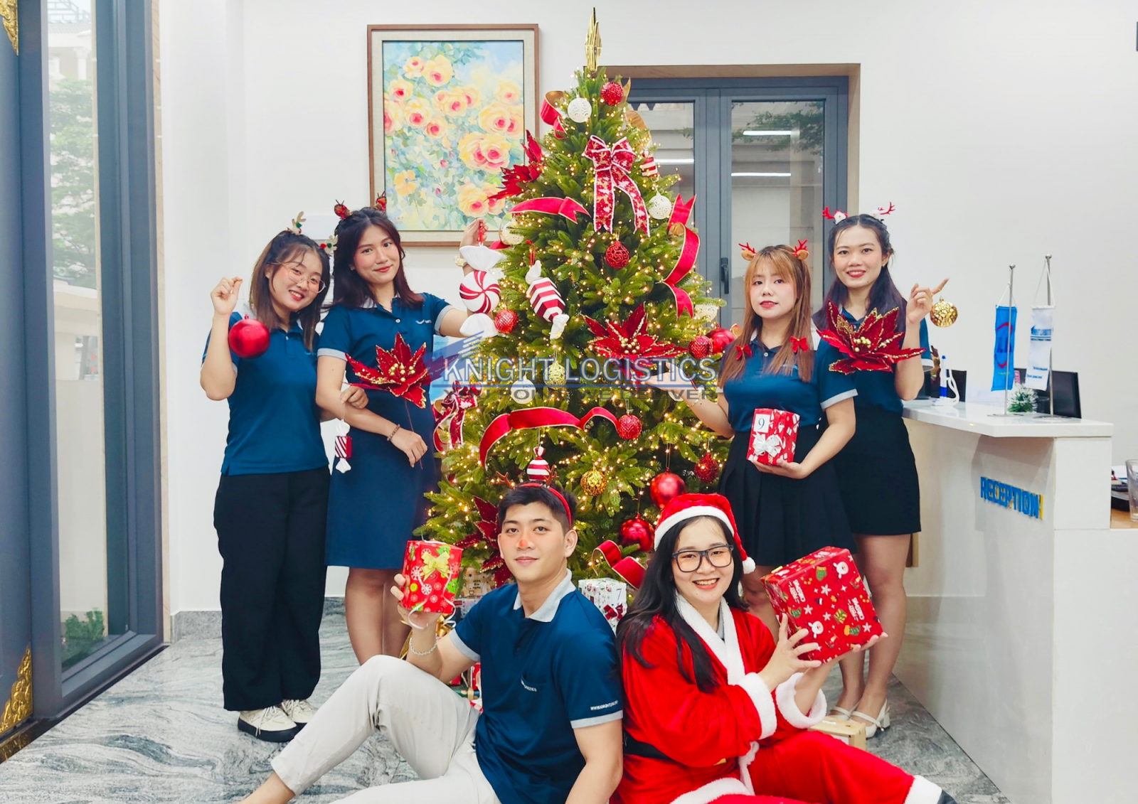 Knight Logistics team spreading holiday cheer with festive decorations and Christmas joy.